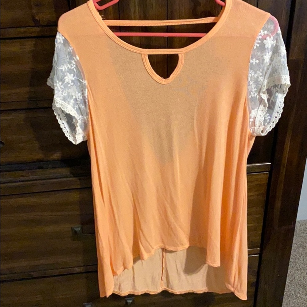 Daytrip top with lace sleeves and open back detail